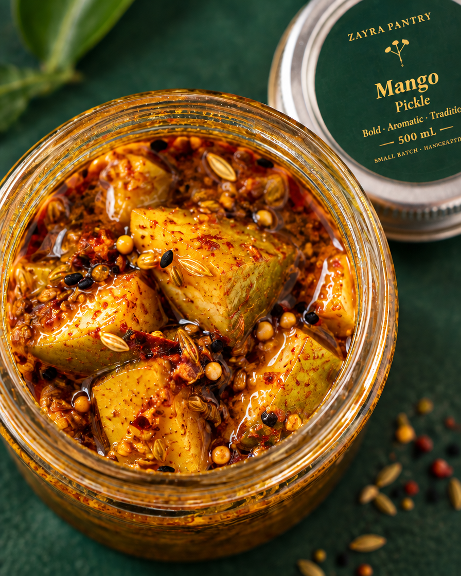 Open mango pickle jar, spice and oil texture close-up